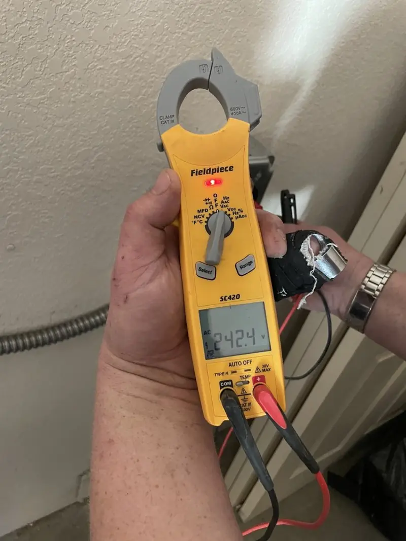 Voltage testing with clamp meter during Hot Tub / Pool Electrical Wiring in Yorkshire